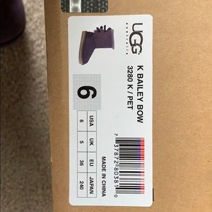 K Bailey Bow Purple Uggs.. size 6